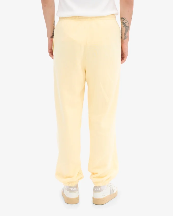 Pantalones de chándal orgánicos de corte holgado - Amarillo suave
