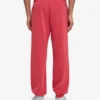Pantalones de chándal orgánicos de corte holgado - Rojo descolorido
